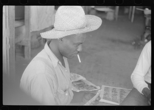 Migratory agricultural worker at Picket's Landing, Virginia, during strawberry season