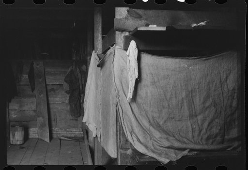 Untitled photo, possibly related to: Migratory agricultural workers at Picket's Landing, Virginia. Card games are frequent but money seldom used