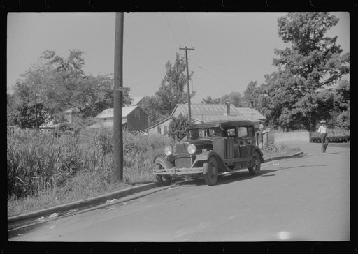 Florida migrant's car on Market Street, Elizabeth City, North Carolina