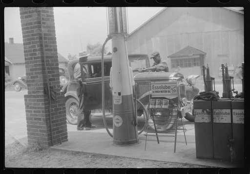 Migratory agricultural workers getting gas at the store in Camden, North Carolina