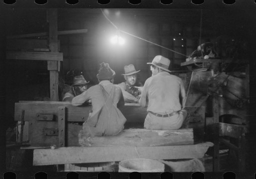 At the pick table end of the potato grader at Belcross, North Carolina