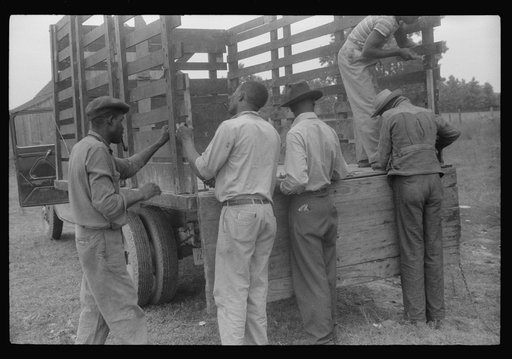 Migrants getting truck ready to leave Belcross, North Carolina for Onley, Virginia