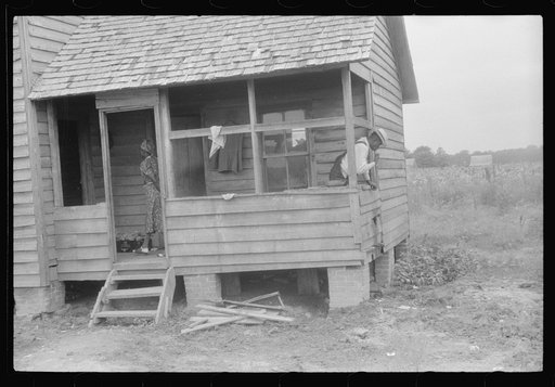 Untitled photo, possibly related to: Migrant packing his bag for a trip from Belcross, North Carolina to another job at Onley, Virgin