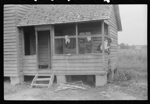 Migrant washing his teeth before leaving for a trip from North Carolina to Onley, Virginia