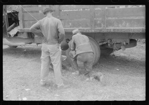 Migrant getting truck ready to leave Belcross, North Carolina for Onley, Virginia