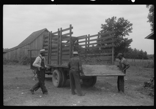 Migrants getting truck ready to leave Belcross, North Carolina for Onley, Virginia