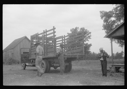 Migrants getting truck ready to leave Belcross, North Carolina for Onley, Virginia
