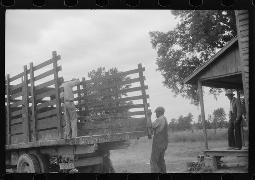 Migrants getting truck ready to leave Belcross, North Carolina for Onley, Virginia