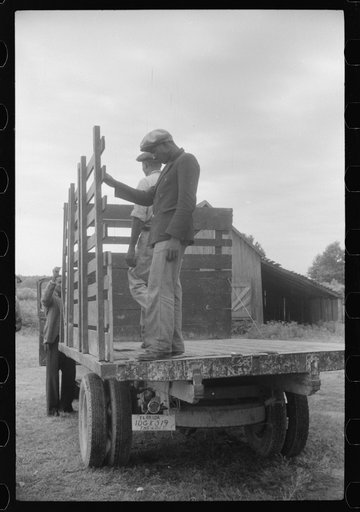 Migrants getting truck ready to leave Belcross, North Carolina for Onley, Virginia