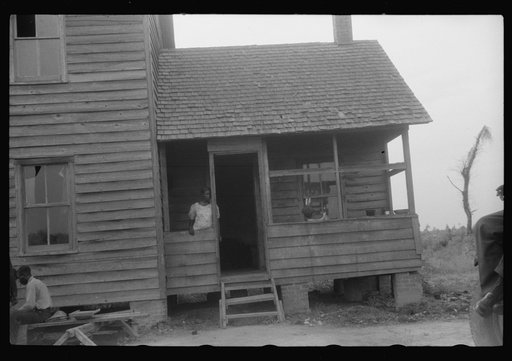 Untitled photo, possibly related to: The last bit of washing is done while waiting for the truck to come and take these migratory workers and thirty-three others to another job at Onley, Virginia. They have been picking potatoes at Belcross, North Carolina