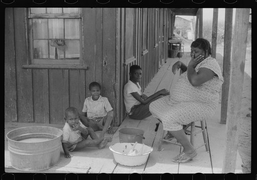 Permanent residents at the W.T. Handy's House, Crisfield, Maryland. They work on canning vegetables for part of the season and oysters the rest