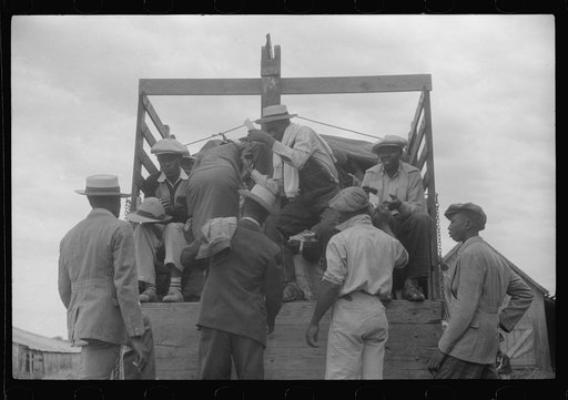 Truckload of migratory agricultural workers leaving Belcross, North Carolina for another job in Onley, Virginia