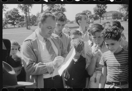 One of the judges at soapbox auto race during July 4th celebration at Salisbury, Maryland