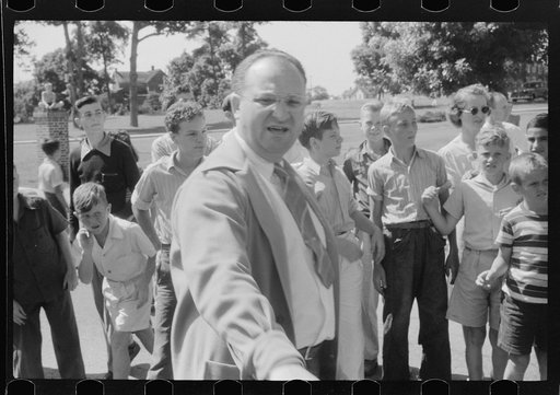 Untitled photo, possibly related to: One of the judges at soapbox auto race during July 4th celebration at Salisbury, Maryland