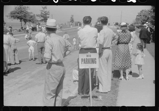 Spectators at soapbox auto race during July 4th celebration at Salisbury, Maryland