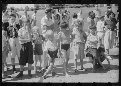 Spectators at soapbox auto race during July 4th celebration at Salisbury, Maryland