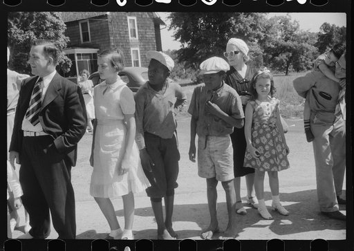 Spectators at soapbox auto race during July 4th celebration at Salisbury, Maryland