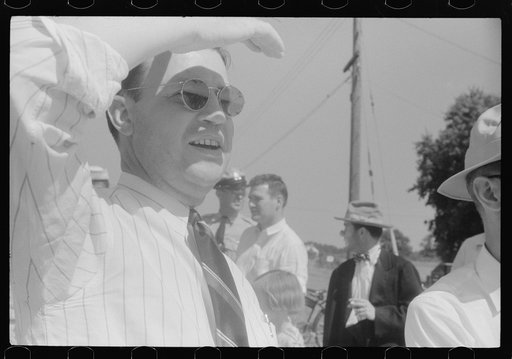 Spectators at soapbox auto race during July 4th celebration at Salisbury, Maryland