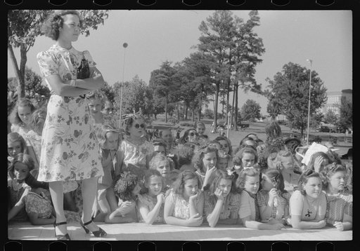 Spectators at beauty contest held during July 4th celebration at Salisbury, Maryland