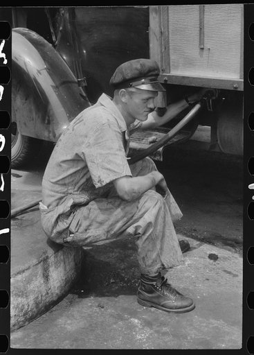 Attendant at truck service station on U.S. 1 (New York Avenue) in Washington, D.C.