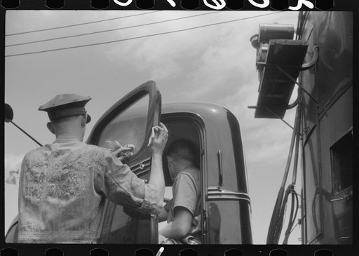 Attendant at truck service station on U.S. 1 (New York Avenue), Washington, D.C.