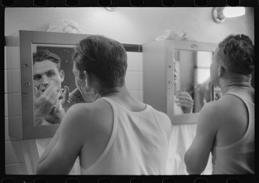 Truck drivers shaving at truck service station on U.S. 1 (New York Avenue), Washington, D.C.