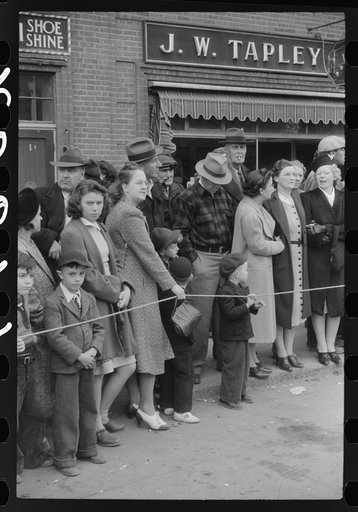 Untitled photo, possibly related to: Spectators at the annual barrel rolling contest in Presque Isle, Maine