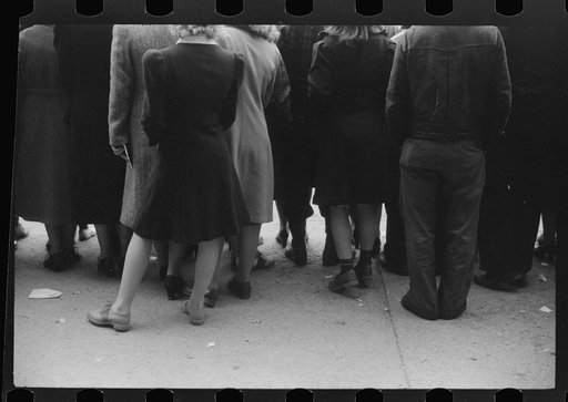Untitled photo, possibly related to: Spectators at the annual barrel rolling contest in Presque Isle, Maine