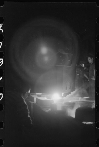 Untitled photo, possibly related to: Tapping a furnace at the foundry of the Farrell-Binmingham Company, Ansonia, Connecticut