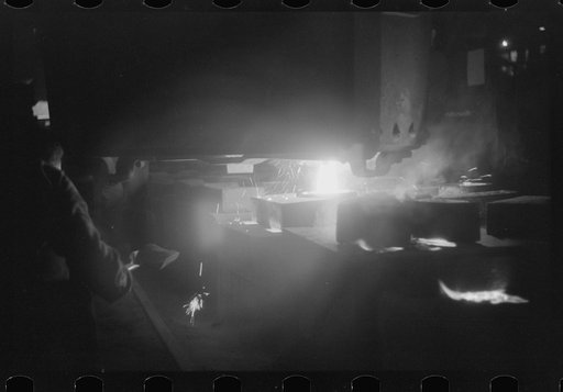 Untitled photo, possibly related to: Tapping a furnace at the foundry of the Farrell-Binmingham Company, Ansonia, Connecticut