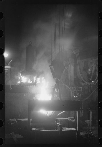 Untitled photo, possibly related to: At the electric furnace in the foundry at the Farrell-Birmingham Company, Ansonia, Connecticut