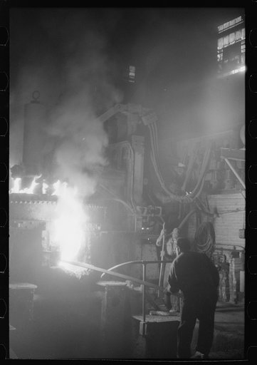At the electric furnace in the foundry at the Farrell-Birmingham Company, Ansonia, Connecticut