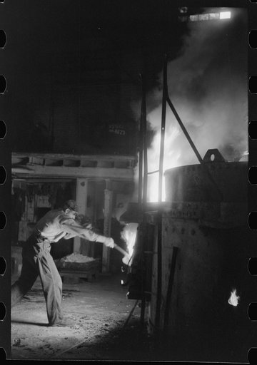 At the electric furnace in the foundry of the Farrell-Birmingham Company, Ansonia, Connecticut