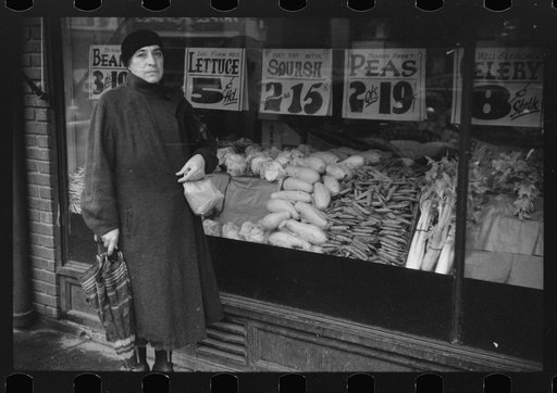 Woman waiting for bus on a rainy day in Norwich, Connecticut