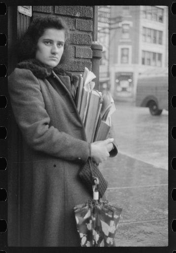 Untitled photo, possibly related to: Young school girl waiting for a bus on a rainy day in Norwich, Connecticut