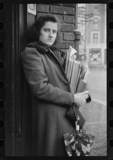 Untitled photo, possibly related to: Young school girl waiting for a bus on a rainy day in Norwich, Connecticut