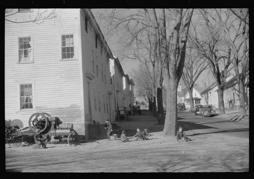 Children playing in the street in the mill town of Occum, Connecticut