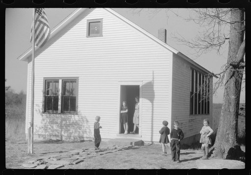Untitled photo, possibly related to: Small children waiting for their older brothers and sisters to be let out of school for lunch. Ledyard, Connecticut
