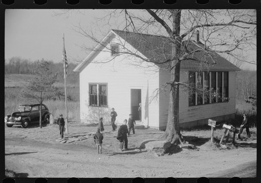 Untitled photo, possibly related to: Small children waiting for their older brothers and sisters to be let out of school for lunch. Ledyard, Connecticut