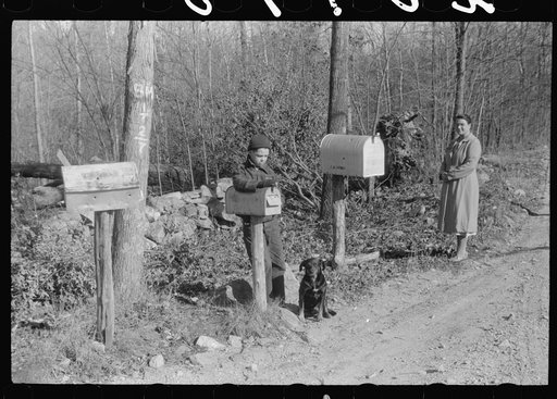 Waiting at a crossroads in Ledyard, Connecticut for the mail carrier. Little boy is a member of the Crouch family