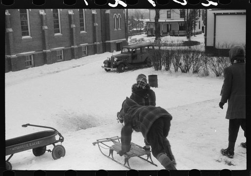 Untitled photo, possibly related to: Children sledding in Jewett City, Connecticut