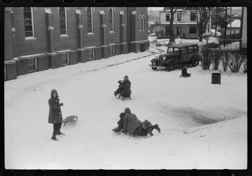 Untitled photo, possibly related to: Children sledding in Jewett City, Connecticut