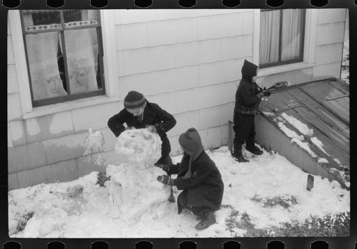 Children playing in snow in Norwich, Connecticut