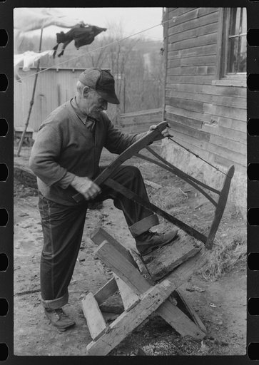 Untitled photo, possibly related to: French Canadian who worked in a paper mill in Montville, Connecticut for eleven years, in front of his house
