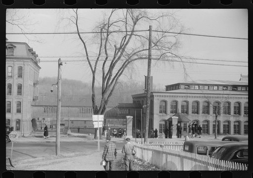 Untitled photo, possibly related to: Taftville, Connecticut. Changes of shifts at Penomah Mills, Inc.