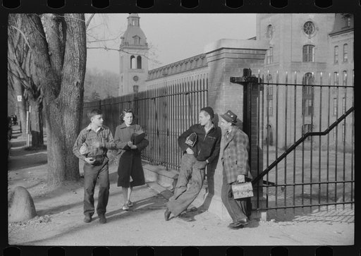 Young workers waiting to go into work at the Penomah Mills Inc., Taftville, Connecticut