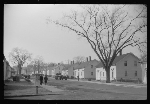 A street in Taftville, Connecticut, during the changing of the shift at the textile mill