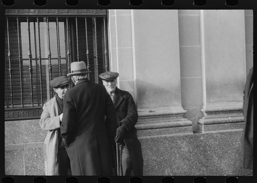 Untitled photo, possibly related to: Men outside of a bank in Woonsocket, Rhode Island