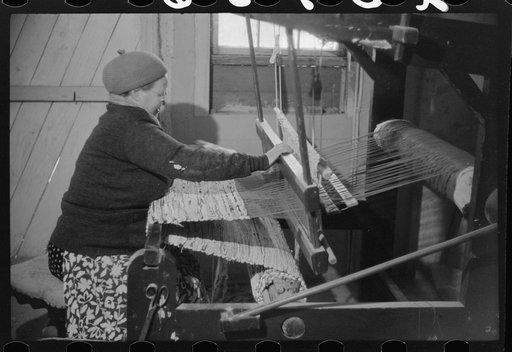 Foster, Rhode Island. Mrs. Simon Kertulla [i.e. Mary Kerttula], wife of a Finnish poultry farmer, working at her old-fashioned loom