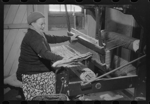 Untitled photo, possibly related to: Mrs. Simon Kertulla [i.e. Mary Kerttula], working at her old fashioned loom. Finnish poultry farmer. Foster, Rhode Island